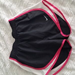 Women's pink/ black Nike running shorts